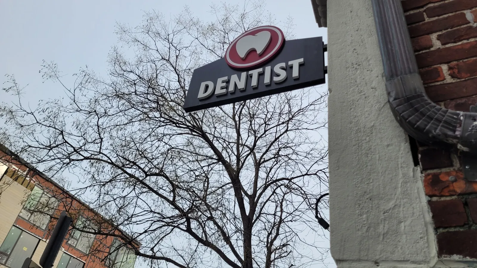 A small business shop exterior on a quiet street, the kind of location that depends on Google Business Profile visibility and word-of-mouth to fill its calendar.